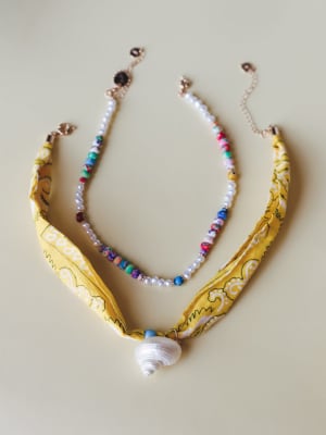 Golden Tide Charm Necklace: undefined