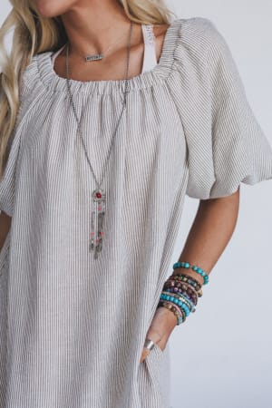 the-nest-solace-ruffled-hem-dress-natural/Beige