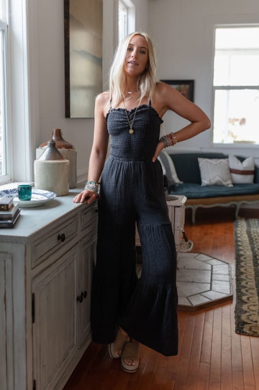 Cutely Curated Black Smocked Ribbed Knit Wide-Leg Jumpsuit